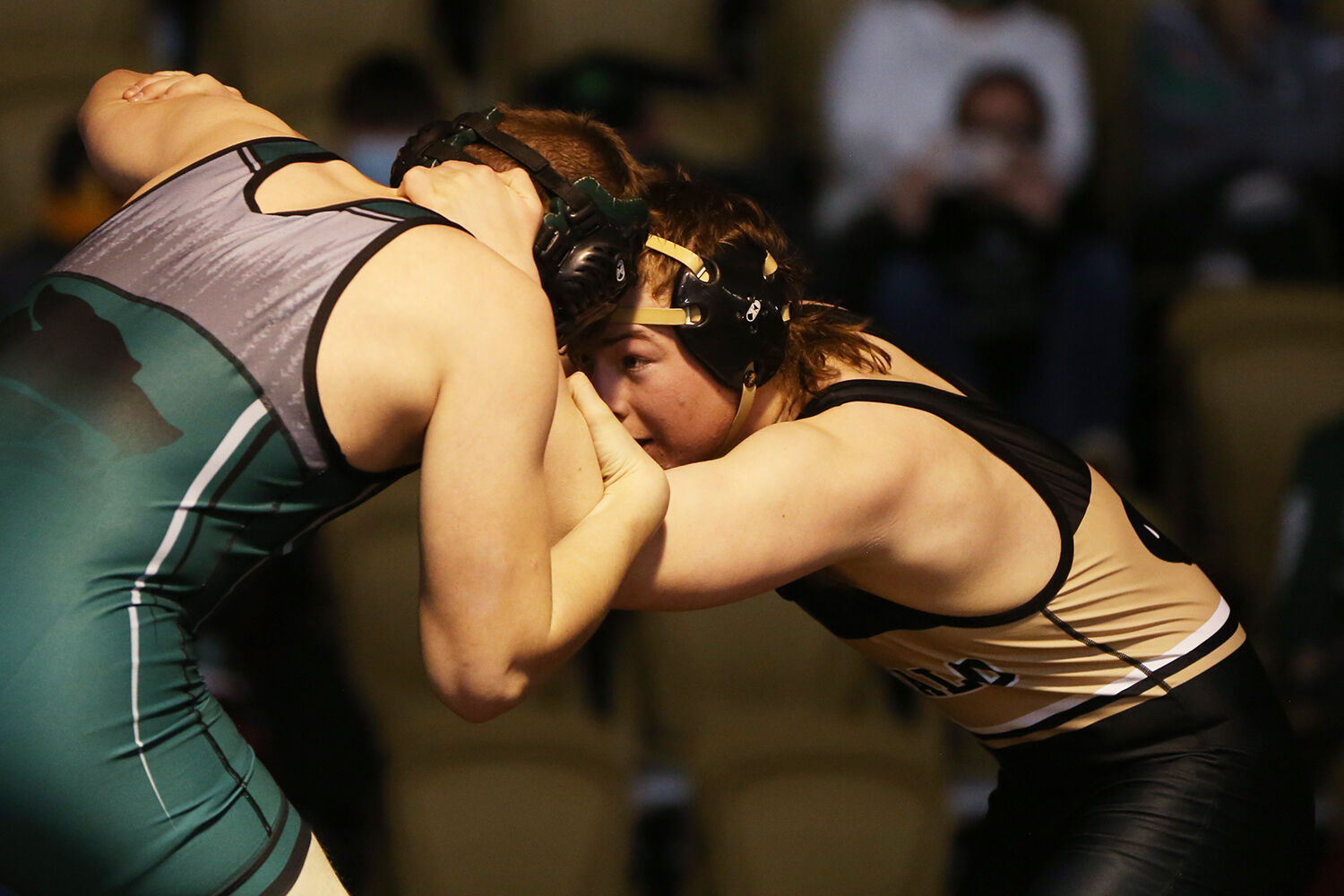 Miles Packard locks onto opponent Michael Cynova